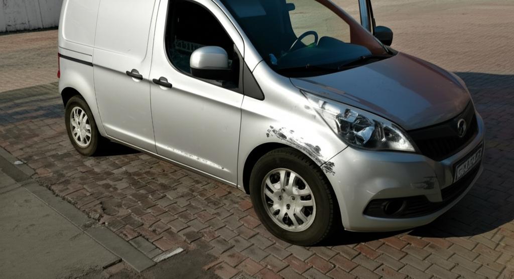 Delivery car with scratches